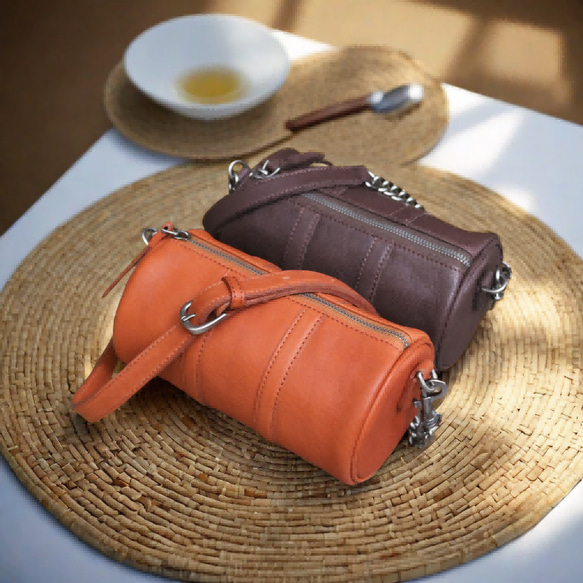 ハンドメイド牛革レディースカジュアルヴィンテージ円筒バッグ、個性派