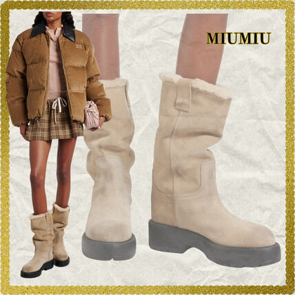 シアリング ムートン MiuMiu(ミュウミュウ) ブーツ(レディース