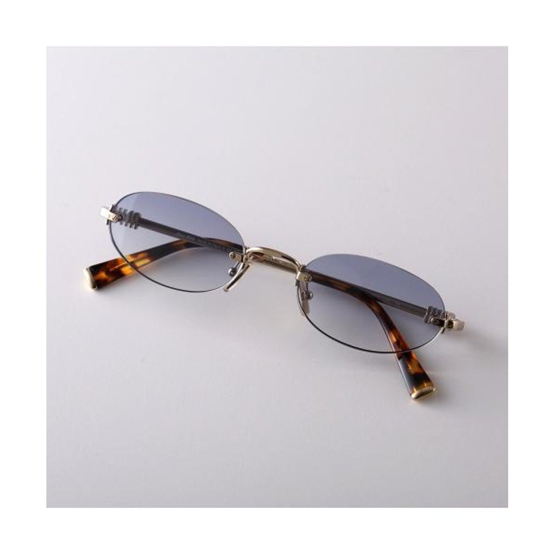 ミュウミュウ Miu Miu MIUMIU サングラス SMU A54 オーバル型 リムレス